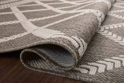  Rainier RAI-05 Natural and ivory modern indoor outdoor area rug, calming colors, weather-resistant polypropylene.