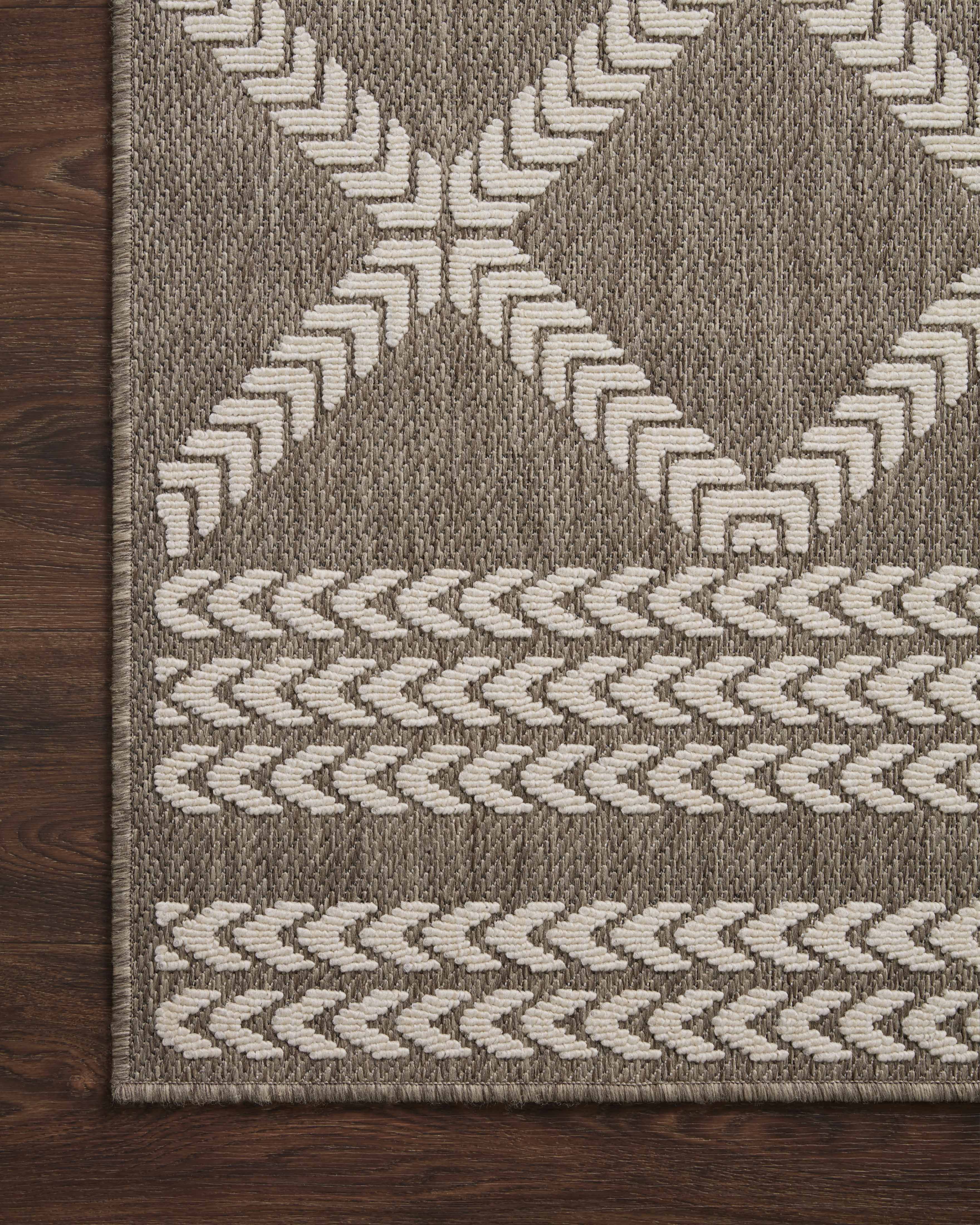  Rainier RAI-05 Natural and ivory modern indoor outdoor area rug, calming colors, weather-resistant polypropylene.