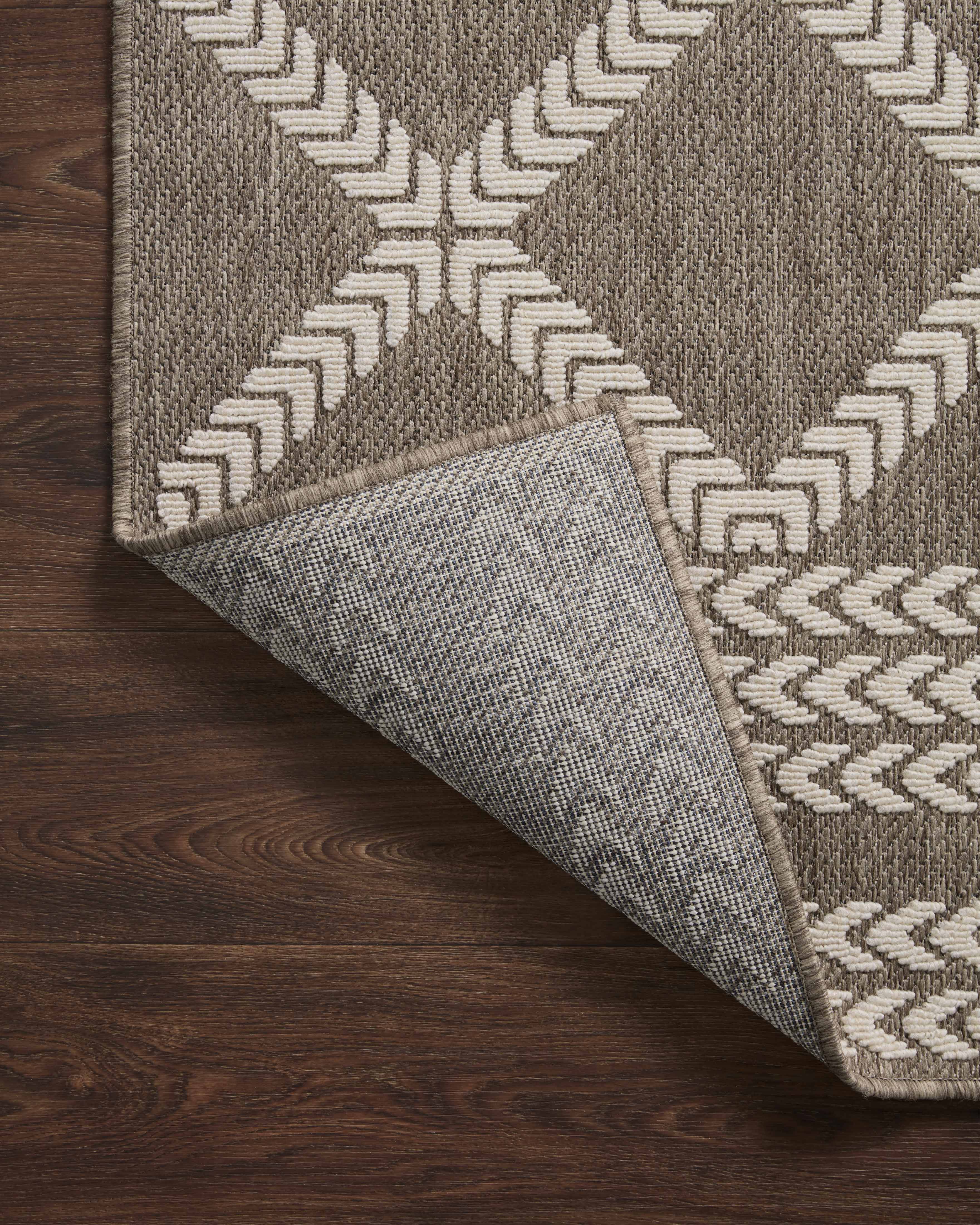  Rainier RAI-05 Natural and ivory modern indoor outdoor area rug, calming colors, weather-resistant polypropylene.