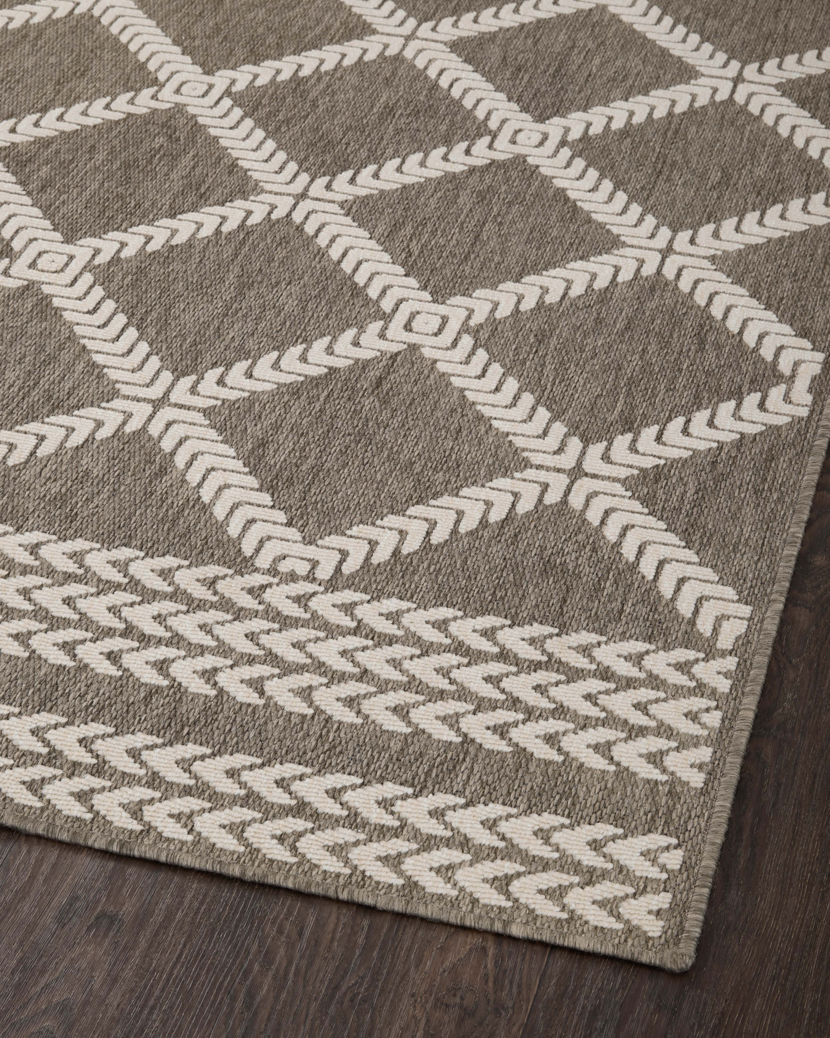  Rainier RAI-05 Natural and ivory modern indoor outdoor area rug, calming colors, weather-resistant polypropylene.