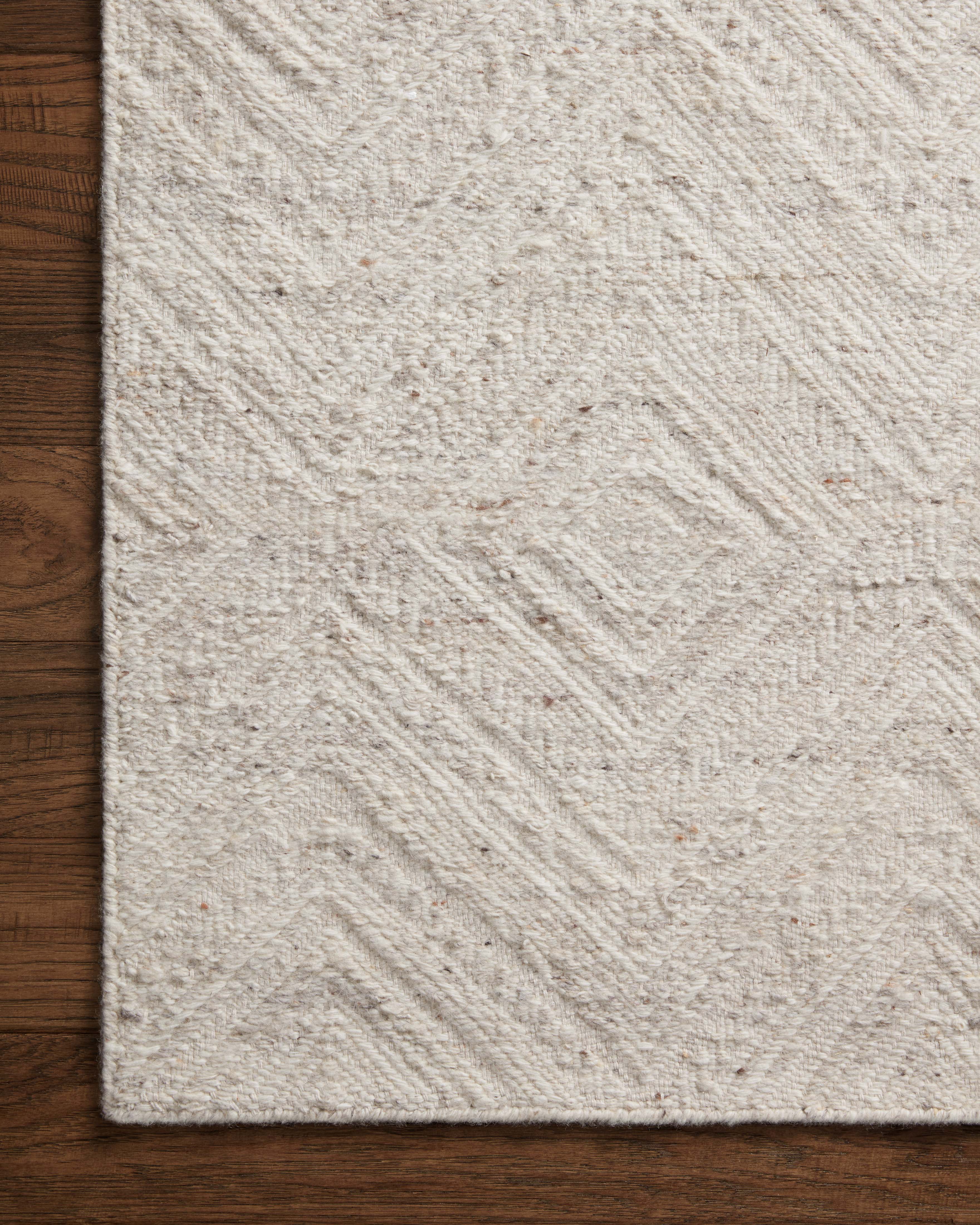Raven RAV-04 Ivory / Pebble Area Rug – Ivory and pebble colored rug with handwoven geometric design, made from wool and cotton. GoodWeave certified for ethical production.