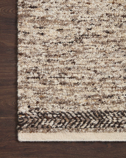 Reyla RLA-01 Granite / Mocha Area Rug, expertly hand-knotted in India, showcasing granite and mocha hues with a sophisticated, heathered effect.