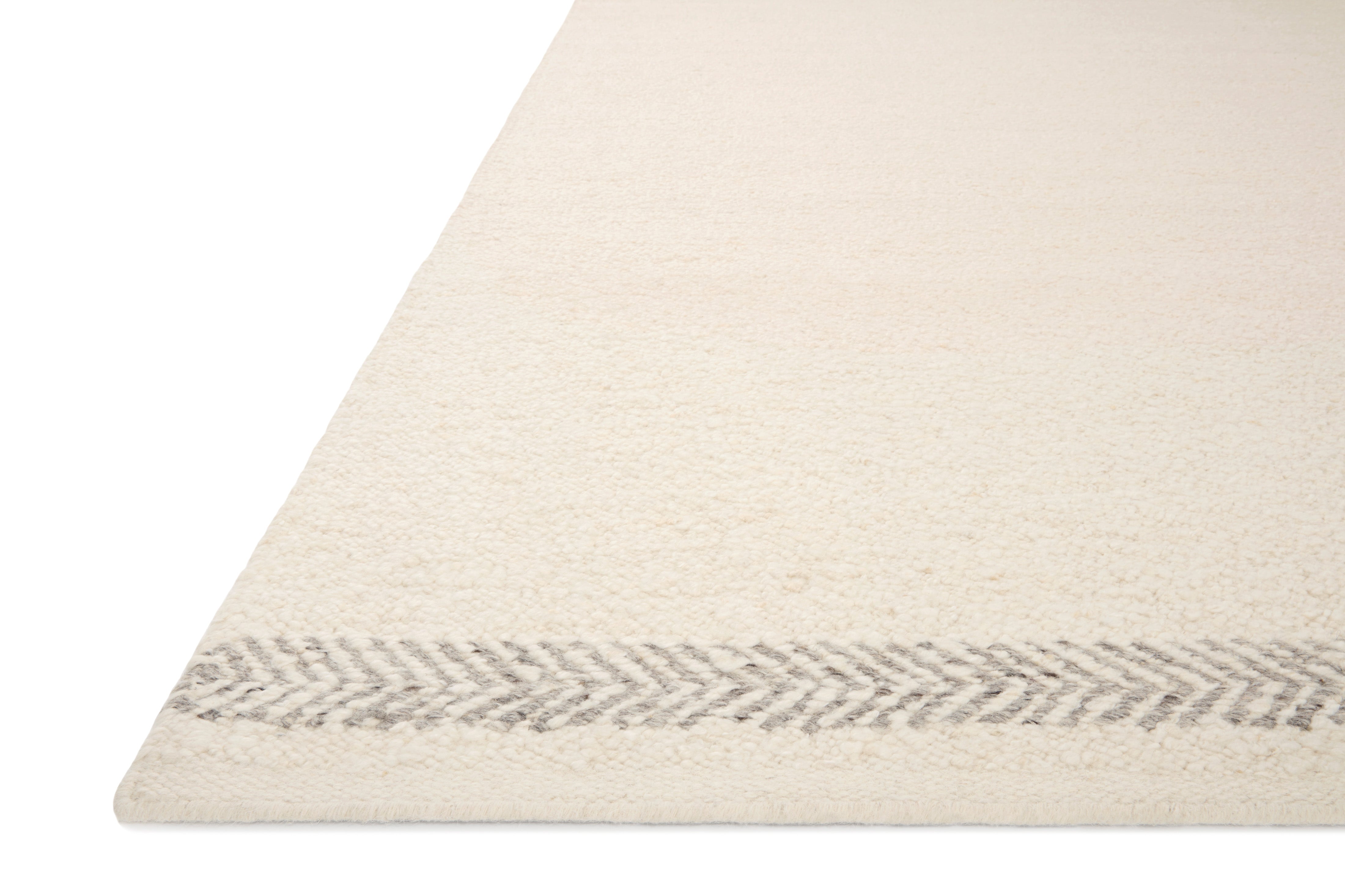 Reyla RLA-01 Ivory / Silver Area Rug, artisan-made in India, blending ivory and silver yarns for a subtle, contemporary heathered texture.