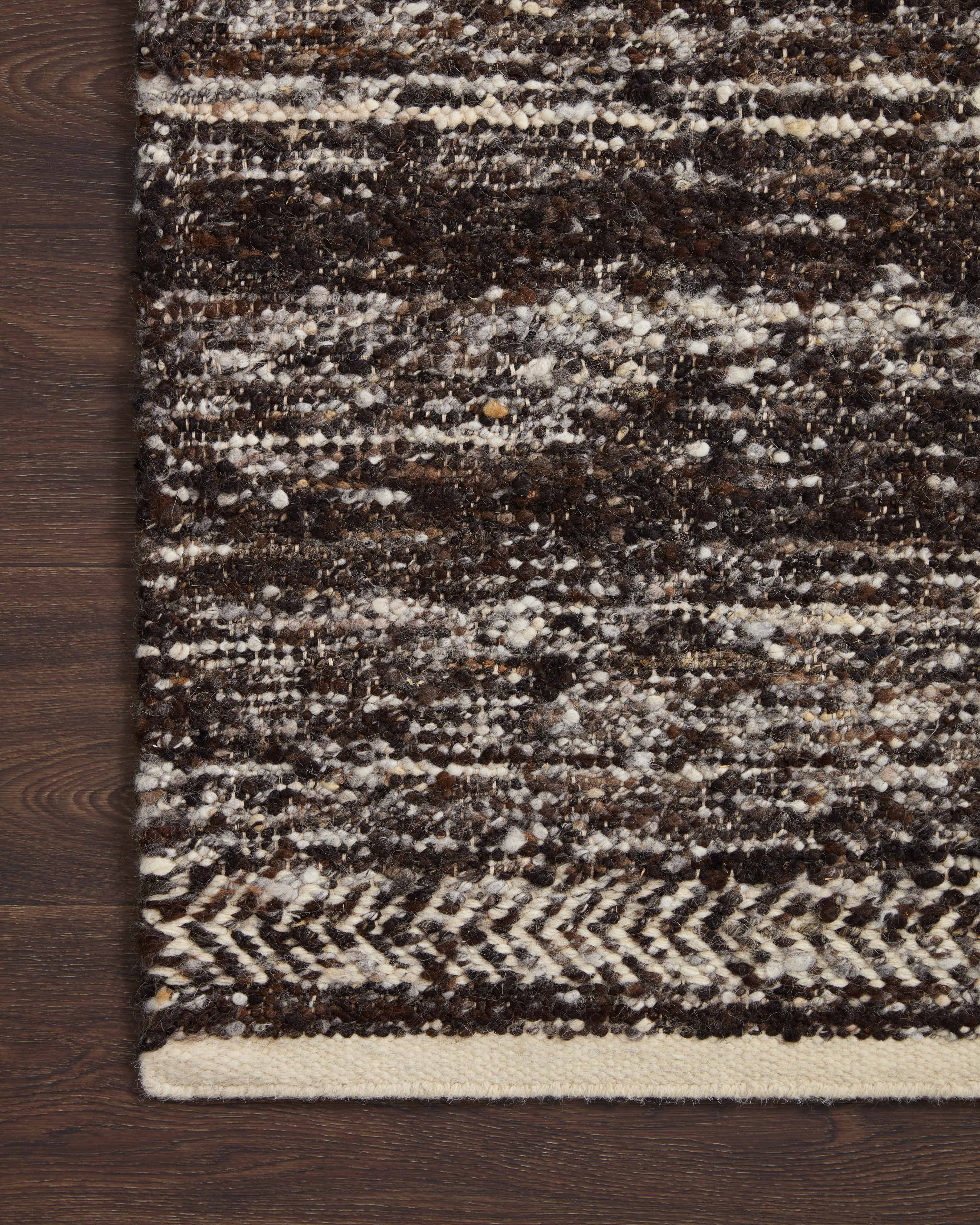 Reyla RLA-01 Mocha / Ivory Area Rug, hand-knotted by Indian artisans, featuring a heathered mix of mocha and ivory tones for a stylish, sustainable appeal.