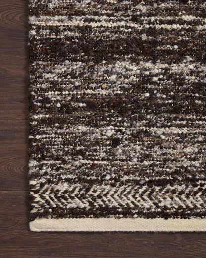 Reyla RLA-01 Mocha / Ivory Area Rug, hand-knotted by Indian artisans, featuring a heathered mix of mocha and ivory tones for a stylish, sustainable appeal.