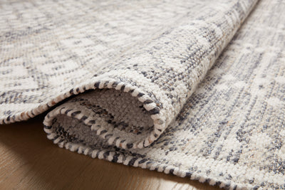 Rivers RIV-01 Area Rug featuring a reversible flatweave design with symmetrical motifs in denim and ivory tones, creating a watercolor effect for modern, neutral spaces.