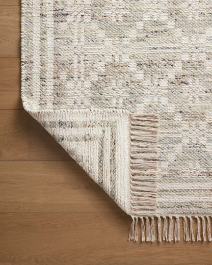 Rivers RIV-02 Area Rug with a reversible flatweave construction, symmetrical motifs, and lagoon and ivory hues for a fresh, natural look in contemporary interiors.