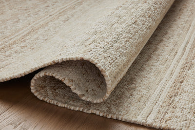 Rivers RIV-03 Area Rug, a contemporary flatweave rug with reversible design, symmetrical motifs, and sand and ivory colors for a soft watercolor effect in neutral palettes.