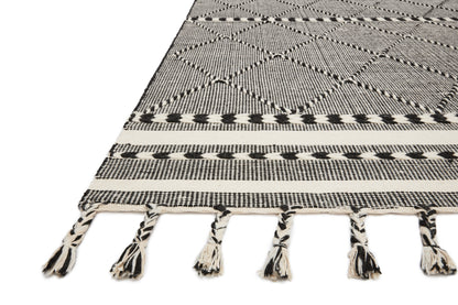Sawyer SAW-01 Black Area Rug with bold graphic pattern and fringe