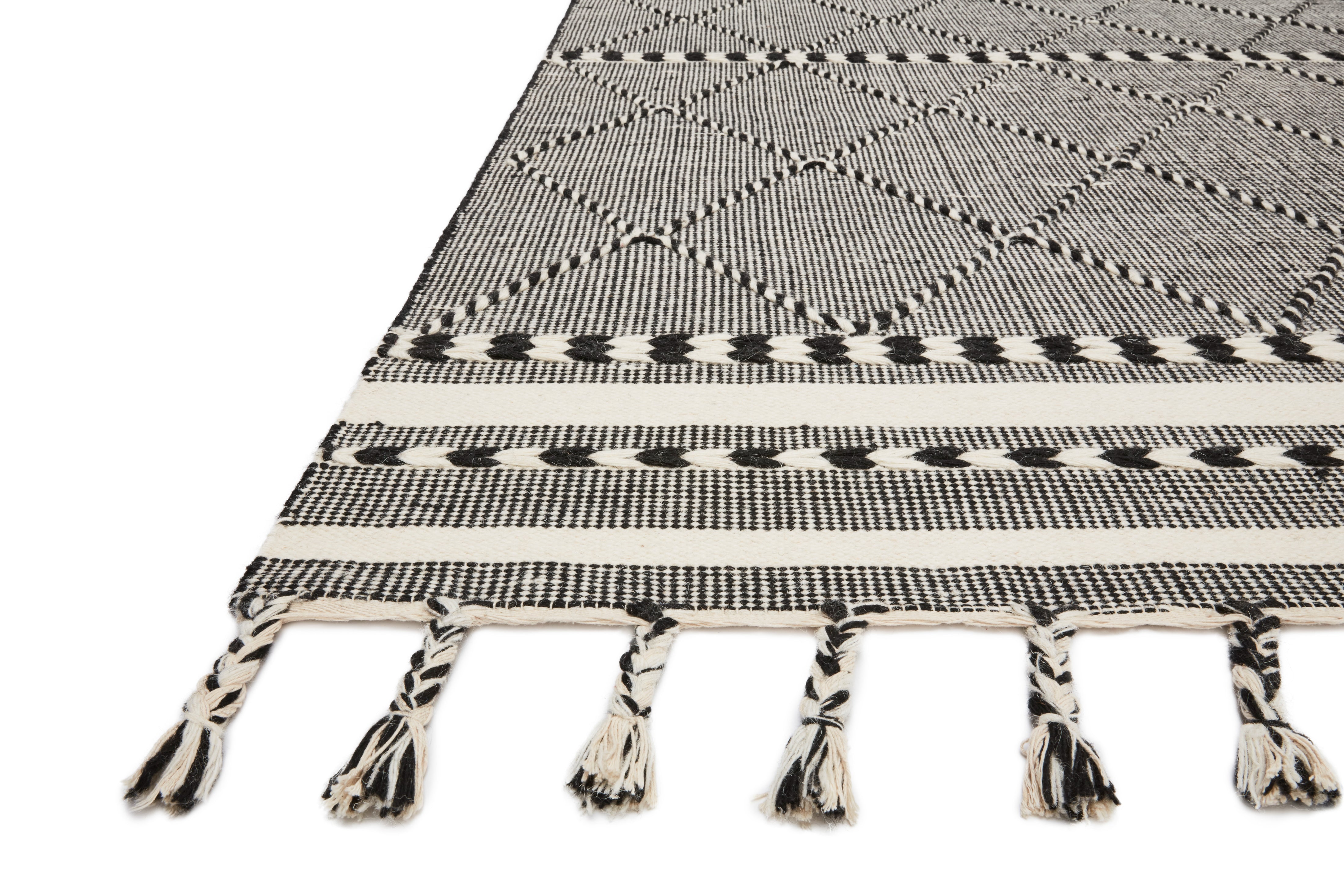 Sawyer SAW-01 Black Area Rug with bold graphic pattern and fringe