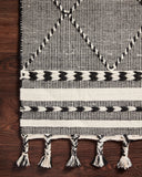 Sawyer SAW-01 Black Area Rug with bold graphic pattern and fringe