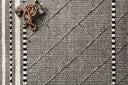 Sawyer SAW-01 Black Area Rug with bold graphic pattern and fringe