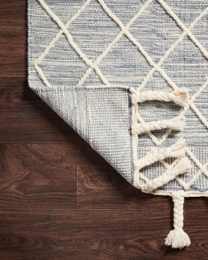 Sawyer SAW-04 Teal Area Rug showcasing bold graphic design and fringe