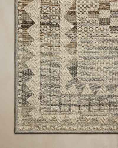 The Saylor SAY-02 Ivory / Granite Area Rug delivers refined ivory and striking granite beauty in a power-loomed polypropylene area rug