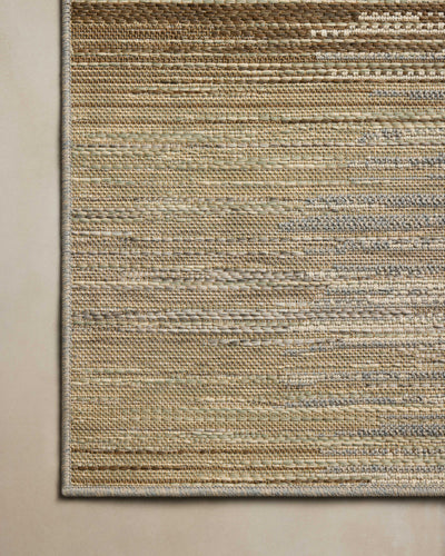 Designed in earthy and warm natural hues, the Saylor SAY-03 Earth / Natural Area Rug is a power-loomed polypropylene area rug that stands out