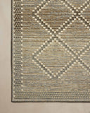 The Saylor SAY-04 Stone / Ivory Area Rug combines grounding stone and refined ivory tones with a power-loomed polypropylene area rug for effortless elegance