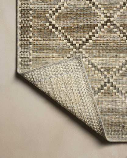The Saylor SAY-04 Stone / Ivory Area Rug combines grounding stone and refined ivory tones with a power-loomed polypropylene area rug for effortless elegance