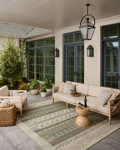 A power-loomed polypropylene area rug with refined ivory and earthy tones, the Saylor SAY-05 Ivory / Earth Area Rug adds character to any room