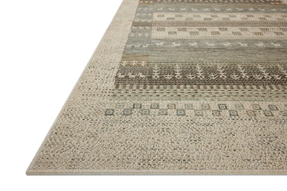 A power-loomed polypropylene area rug with refined ivory and earthy tones, the Saylor SAY-05 Ivory / Earth Area Rug adds character to any room