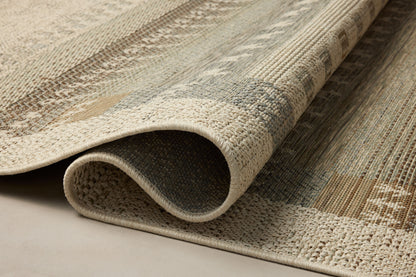 A power-loomed polypropylene area rug with refined ivory and earthy tones, the Saylor SAY-05 Ivory / Earth Area Rug adds character to any room