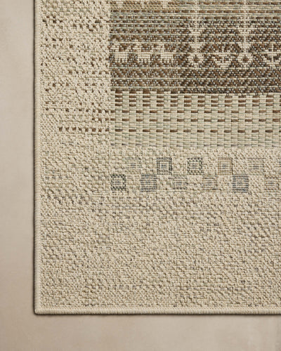A power-loomed polypropylene area rug with refined ivory and earthy tones, the Saylor SAY-05 Ivory / Earth Area Rug adds character to any room