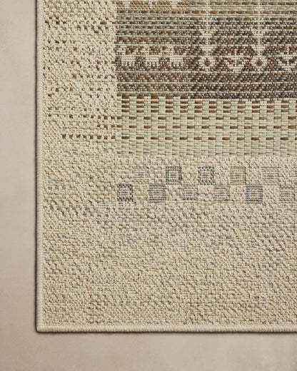 A power-loomed polypropylene area rug with refined ivory and earthy tones, the Saylor SAY-05 Ivory / Earth Area Rug adds character to any room