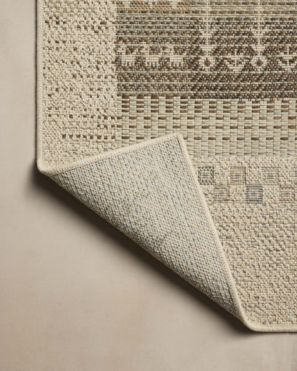 A power-loomed polypropylene area rug with refined ivory and earthy tones, the Saylor SAY-05 Ivory / Earth Area Rug adds character to any room