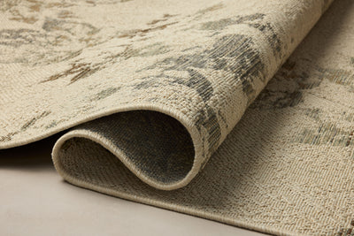 Rich in refined ivory and grounded bark hues, the Saylor SAY-06 Ivory / Bark Area Rug is a power-loomed polypropylene area rug built for style and comfort