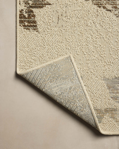 Rich in refined ivory and grounded bark hues, the Saylor SAY-06 Ivory / Bark Area Rug is a power-loomed polypropylene area rug built for style and comfort