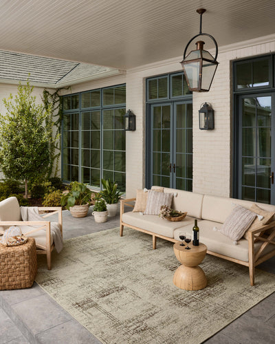 The Saylor SAY-07 Ivory / Fog Area Rug offers refined ivory and misty sophistication in a power-loomed polypropylene area rug