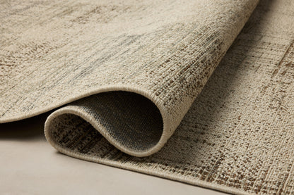 The Saylor SAY-07 Ivory / Fog Area Rug offers refined ivory and misty sophistication in a power-loomed polypropylene area rug