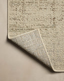 The Saylor SAY-07 Ivory / Fog Area Rug offers refined ivory and misty sophistication in a power-loomed polypropylene area rug
