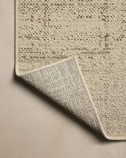 The Saylor SAY-07 Ivory / Fog Area Rug offers refined ivory and misty sophistication in a power-loomed polypropylene area rug