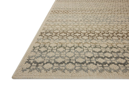 The Saylor SAY-09 Ivory / Multi Area Rug brings refined ivory and vibrant multi-toned character to your home in a power-loomed polypropylene area rug