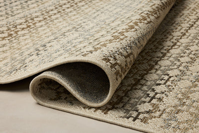 The Saylor SAY-09 Ivory / Multi Area Rug brings refined ivory and vibrant multi-toned character to your home in a power-loomed polypropylene area rug