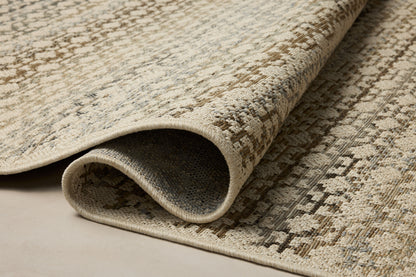 The Saylor SAY-09 Ivory / Multi Area Rug brings refined ivory and vibrant multi-toned character to your home in a power-loomed polypropylene area rug