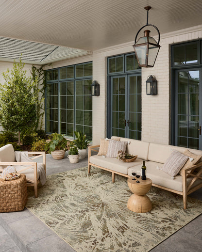 Finished in refined ivory and grounding stone tones, the Saylor SAY-10 Ivory / Stone Area Rug is a power-loomed polypropylene area rug for modern living