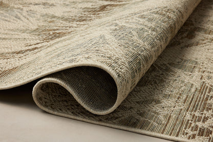 Finished in refined ivory and grounding stone tones, the Saylor SAY-10 Ivory / Stone Area Rug is a power-loomed polypropylene area rug for modern living