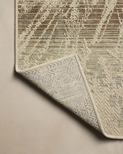 Finished in refined ivory and grounding stone tones, the Saylor SAY-10 Ivory / Stone Area Rug is a power-loomed polypropylene area rug for modern living