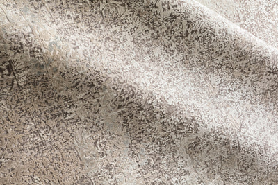 Sienne SIE-01 Ivory/Pebble area rug with subtle distressed motif, neutral palette, silky sheen