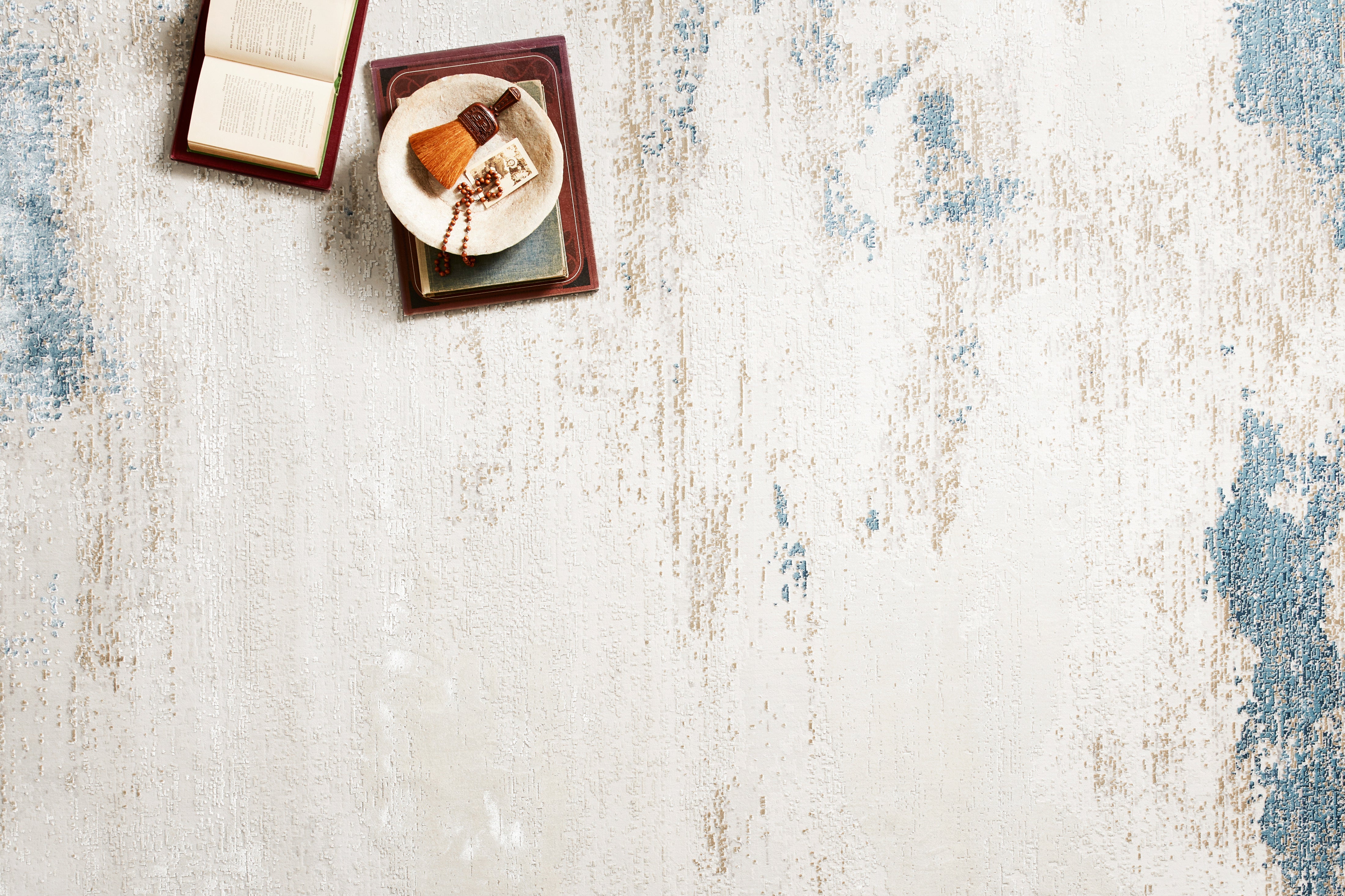 Sienne SIE-08 Sand/Ocean area rug with tonal distressed pattern, sand neutrals with ocean blue accents