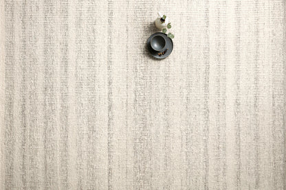 The Sloane SLN-01 Mist Area Rug showcases soft misty tones in a hand-woven wool, cotton, and polyester area rug with bohemian and contemporary style
