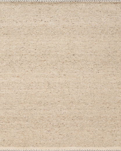 Featuring warm natural hues and bohemian and contemporary detail, the Sloane SLN-01 Natural Area Rug is a hand-woven wool, cotton, and polyester area rug for any room