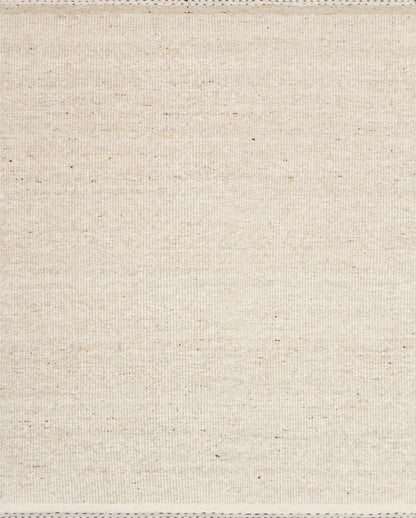 A hand-woven wool, cotton, and polyester area rug with bohemian and contemporary flair in cozy oatmeal tones, the Sloane SLN-01 Oatmeal Area Rug anchors any room