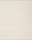 The Sloane SLN-01 Sky Area Rug pairs breezy sky-blue tones and bohemian and contemporary patterns in a hand-woven wool, cotton, and polyester area rug