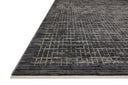 With bold onyx and shimmering silver hues and contemporary and abstract styling, the Soho SOH-01 Onyx / Silver Area Rug is a power-loomed 100% polyester area rug that elevates any room