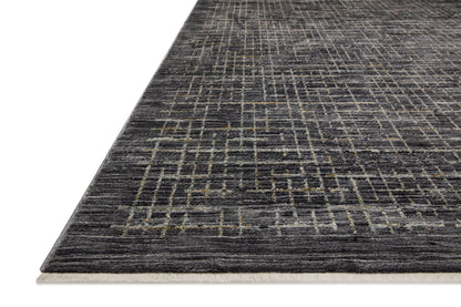 With bold onyx and shimmering silver hues and contemporary and abstract styling, the Soho SOH-01 Onyx / Silver Area Rug is a power-loomed 100% polyester area rug that elevates any room