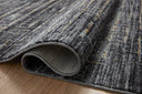 With bold onyx and shimmering silver hues and contemporary and abstract styling, the Soho SOH-01 Onyx / Silver Area Rug is a power-loomed 100% polyester area rug that elevates any room