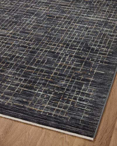 With bold onyx and shimmering silver hues and contemporary and abstract styling, the Soho SOH-01 Onyx / Silver Area Rug is a power-loomed 100% polyester area rug that elevates any room