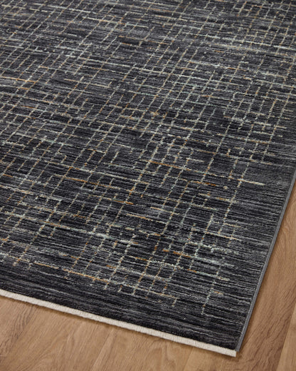 With bold onyx and shimmering silver hues and contemporary and abstract styling, the Soho SOH-01 Onyx / Silver Area Rug is a power-loomed 100% polyester area rug that elevates any room